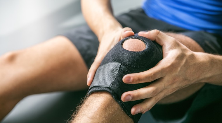 a brace on a man's knee